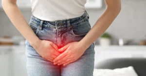 Woman experiencing bladder leakage discomfort, representing O-Shot Therapy in Sugar Land, TX