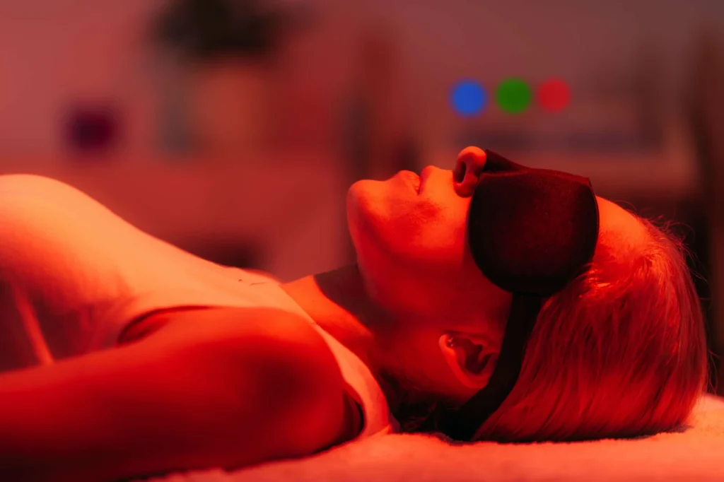 Woman taking Red Light Therapy at Rejuven8 Medical in Sugar Land TX